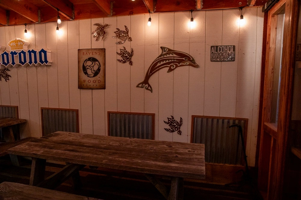 Nighttime Ocean Cove Lodge pool with reflections and relaxing setting